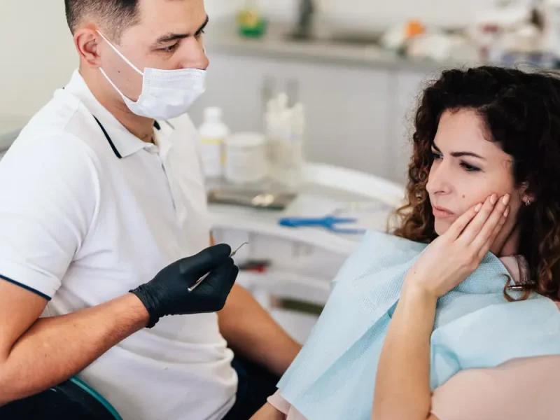 woman-with-toothache-dentist-ezgif.com-optiwebp